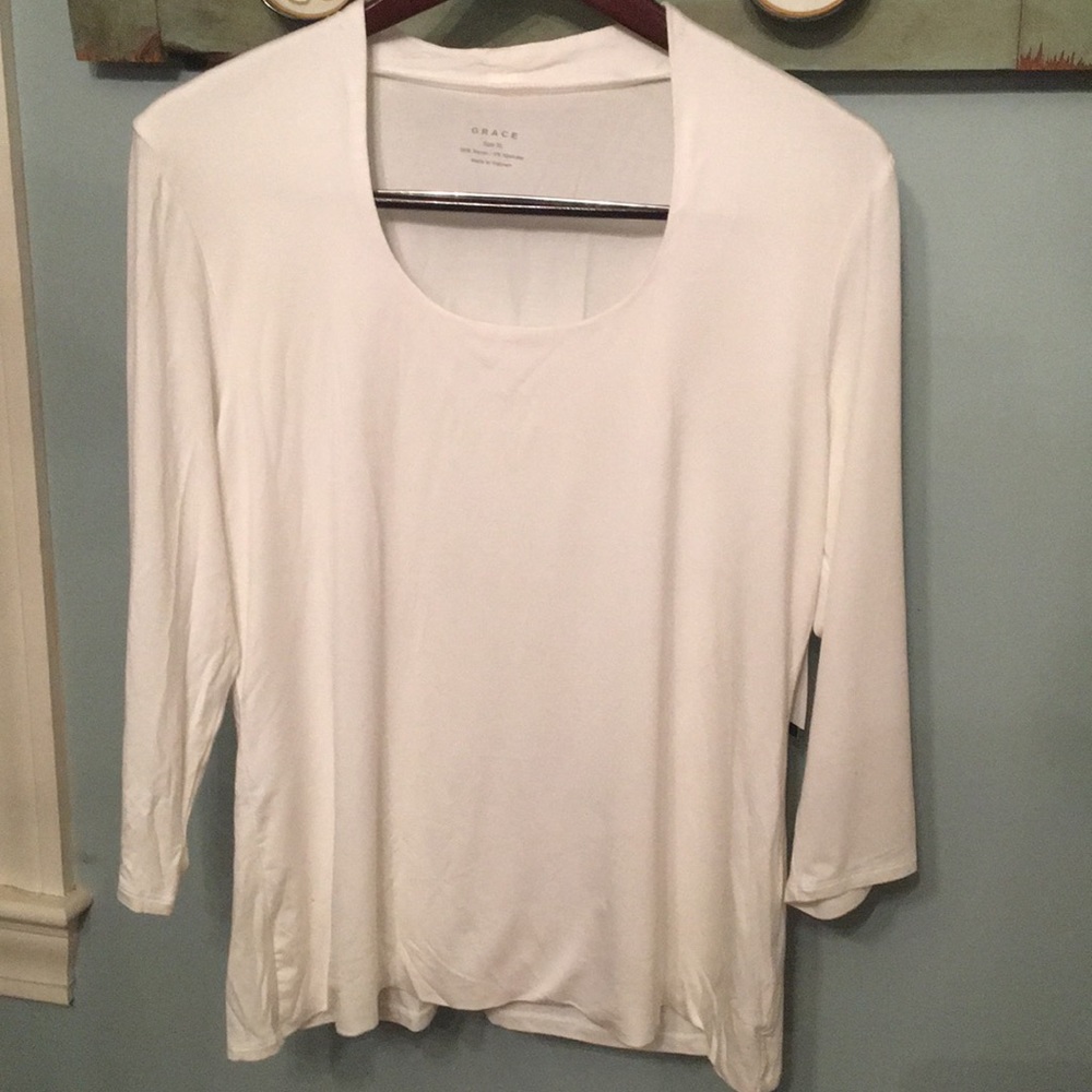 White top. 3/4 sleeves